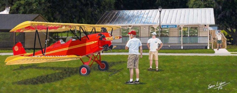 Aviation Art by Sam Lyons, 'Birdmen in Paradise' shows a bright red and yellow Fleet NC 431K on display on green grass.